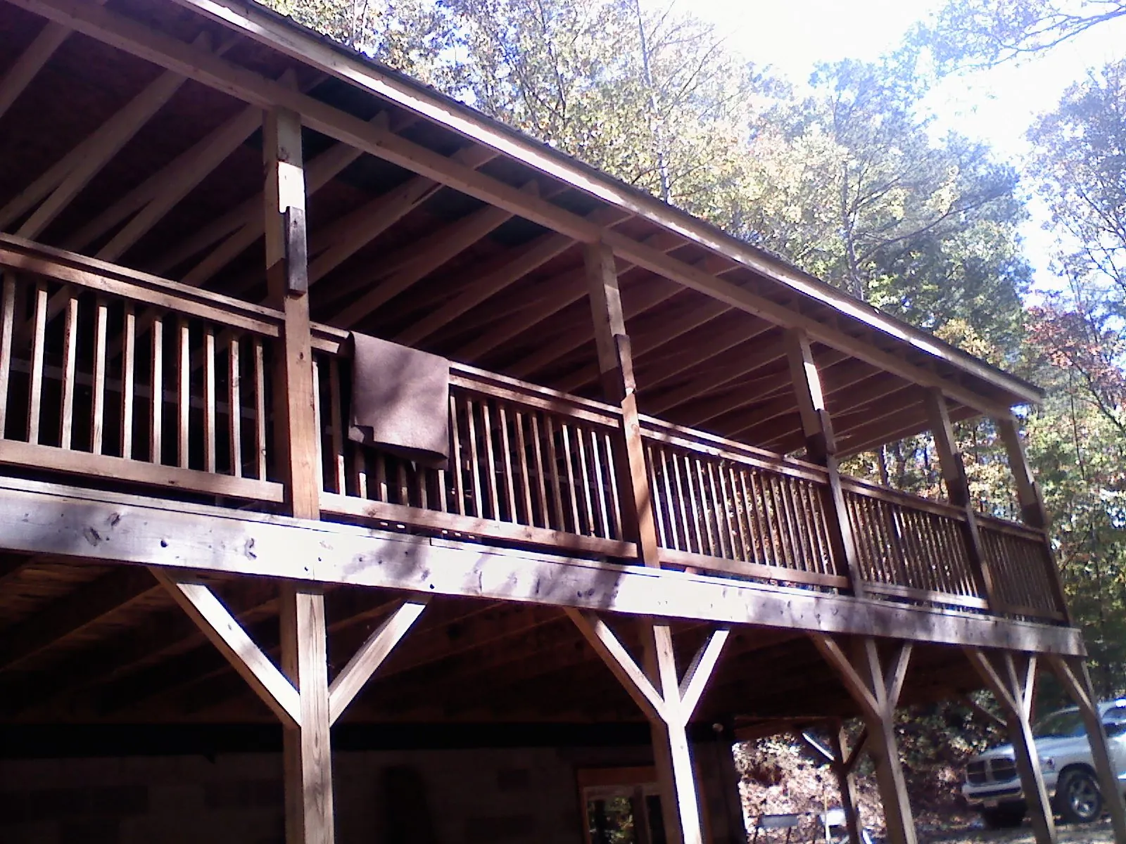 Timber framing under a new elevated porch and deck — Roof Leak Repair in Mattoon by Roofing Brothers